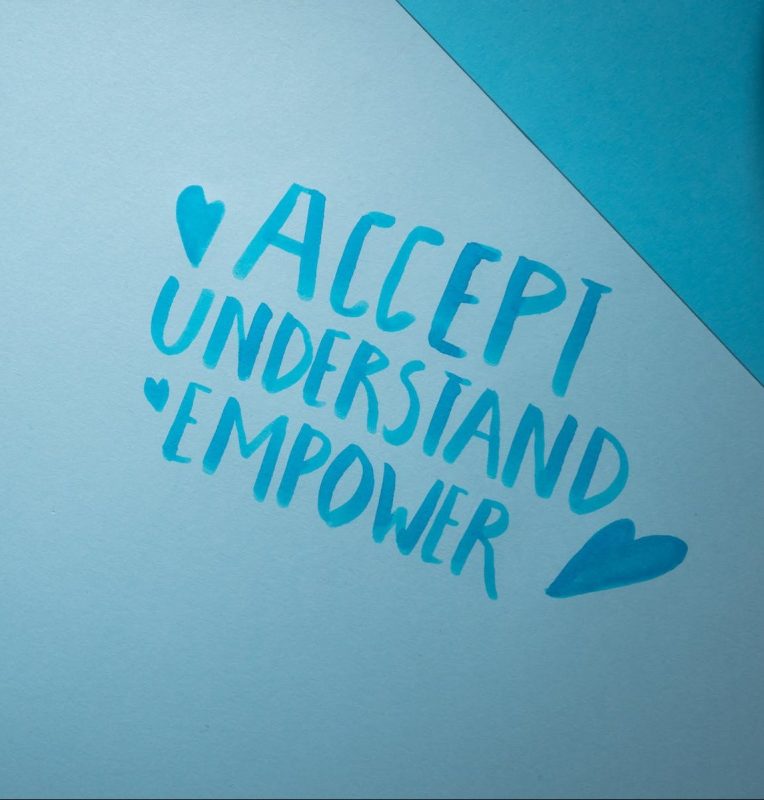 Handwritten Words on a Blue Surface